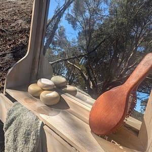 Hydration shampoo bars on mirror in outdoor bathroom setting – natural haircare ritual
